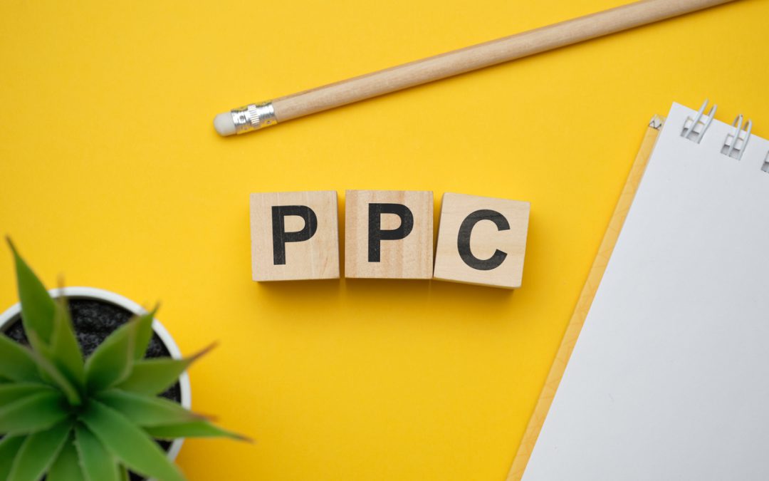 Wood blocks spell PPC or pay-per-click.
