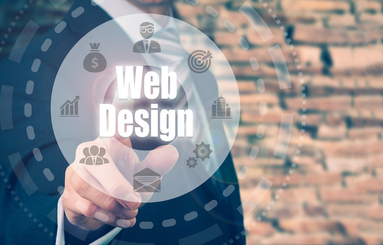 A businessman selecting a Web Design Concept button on a circular panel