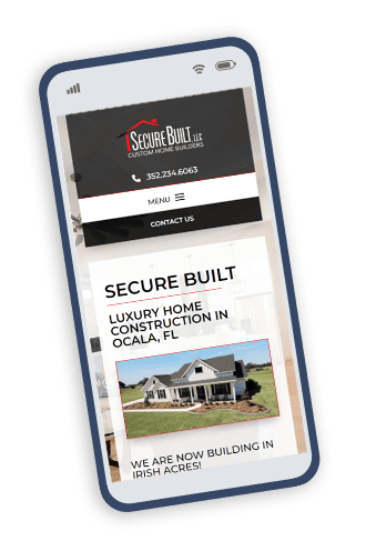 Custom home builder website displayed on mobile phone.
