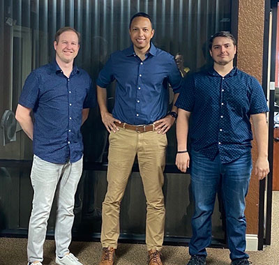 Team members in the Ocala office building accidentally wear matching shirts.